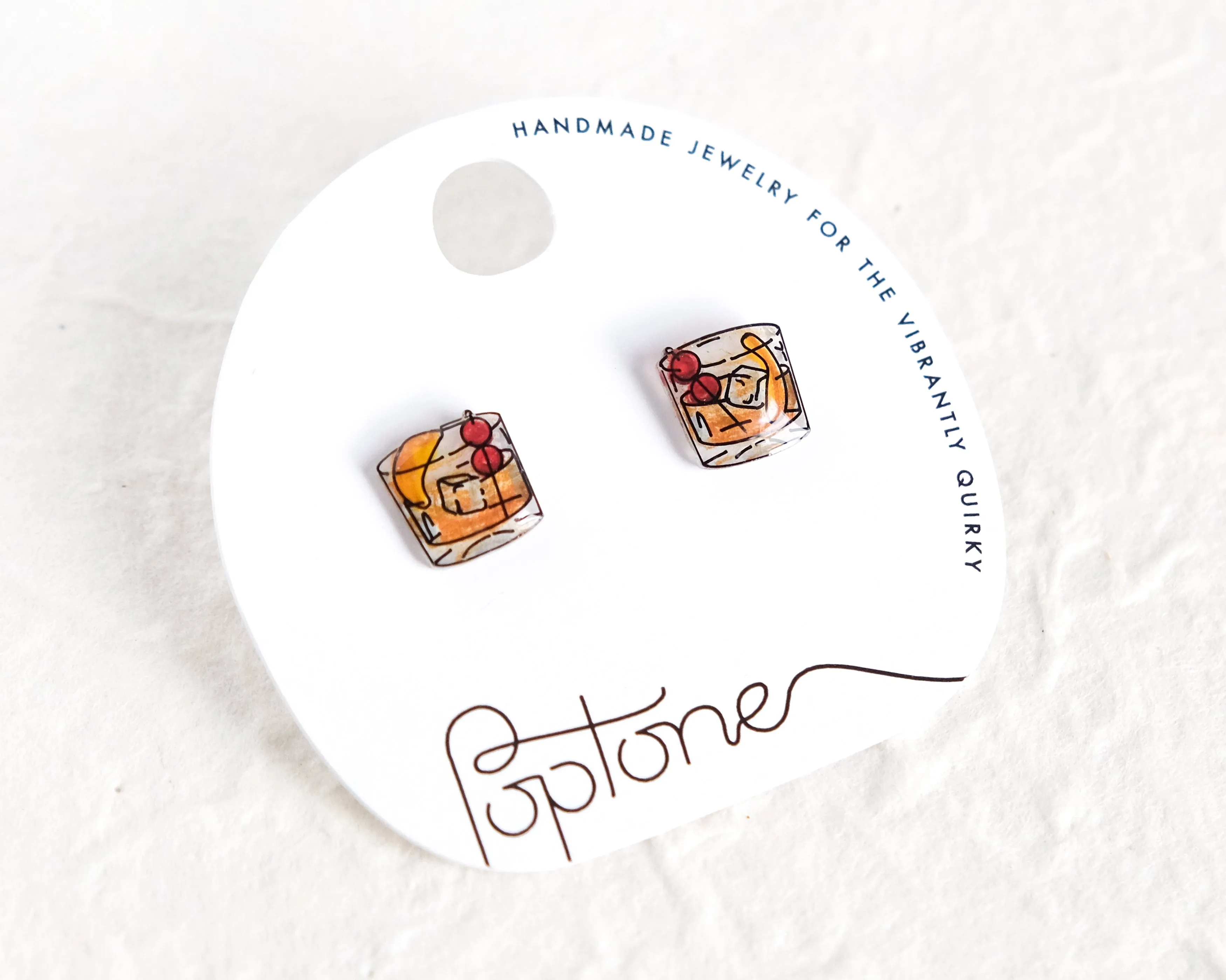 Old Fashioned Cocktails | glass of whiskey drink cocktail party earrings