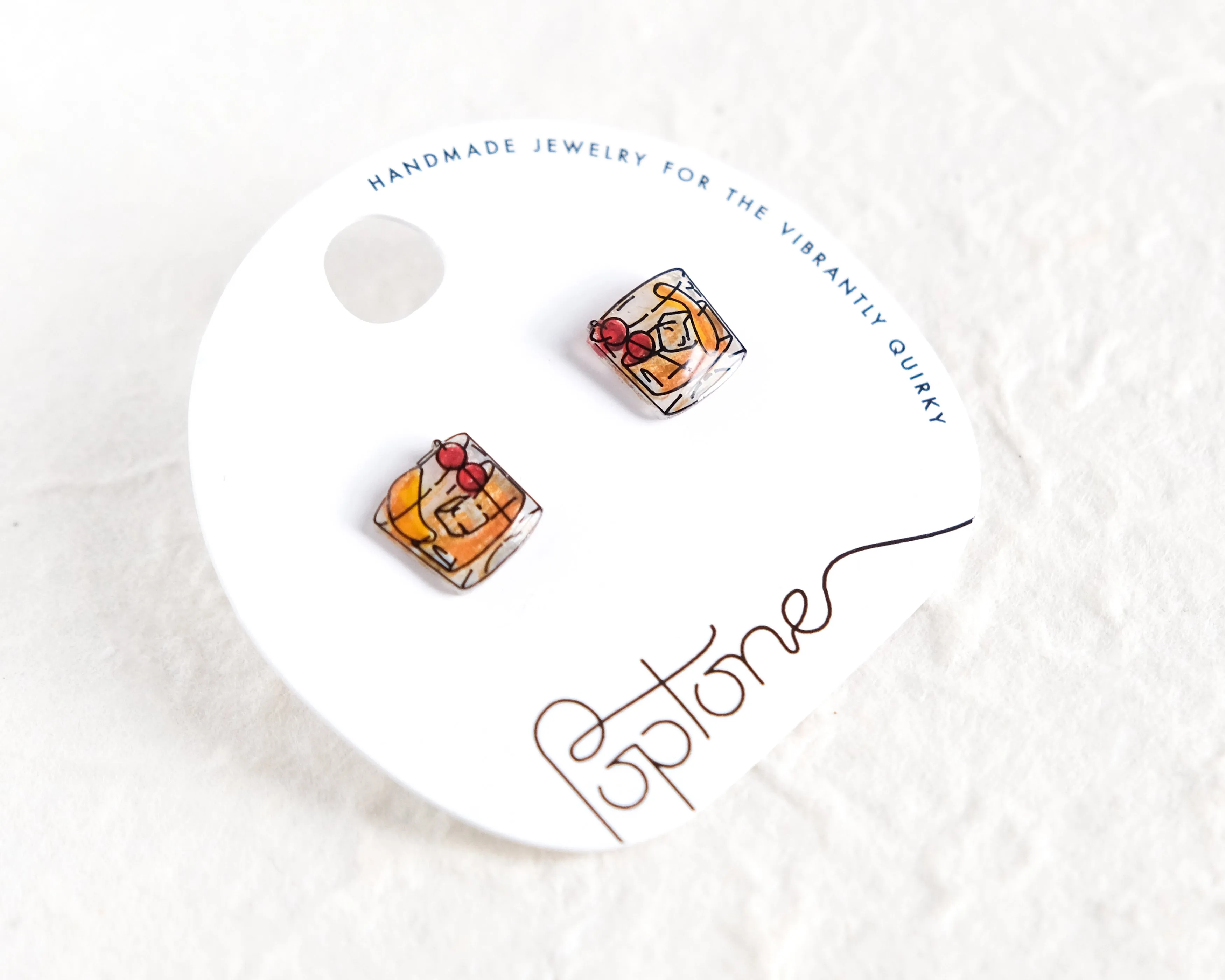 Old Fashioned Cocktails | glass of whiskey drink cocktail party earrings