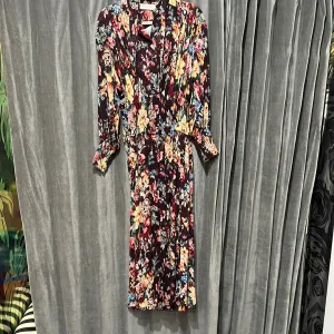 Zimmermann Long Sleeve Middle Elastic Floral Button Down Floral Flowy Dress